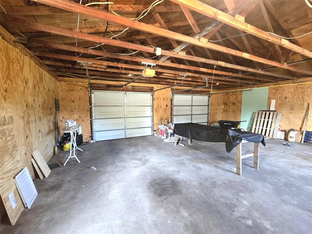 3101 Medulla Road Plant City, FL 33566 - Photo 35 of 83 a view of a room with wooden floor and chair