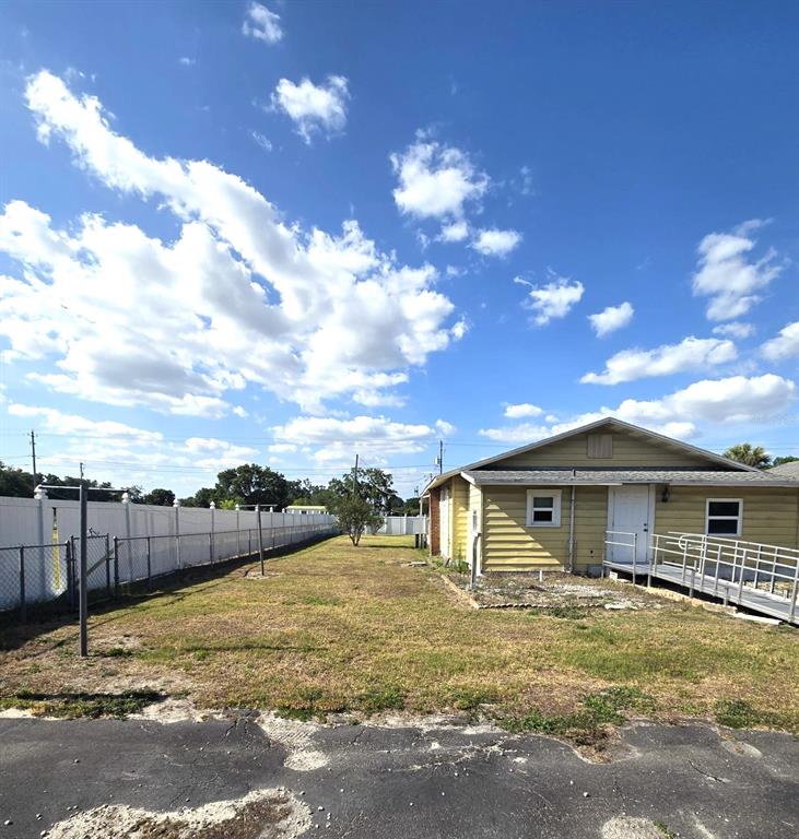 3101 Medulla Road Plant City, FL 33566 - Photo 42 of 83 a view of a house with swimming pool and a yard
