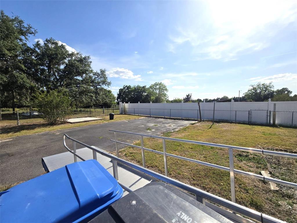 3101 Medulla Road Plant City, FL 33566 - Photo 51 of 83 a view of a tennis court with a basket ball ground