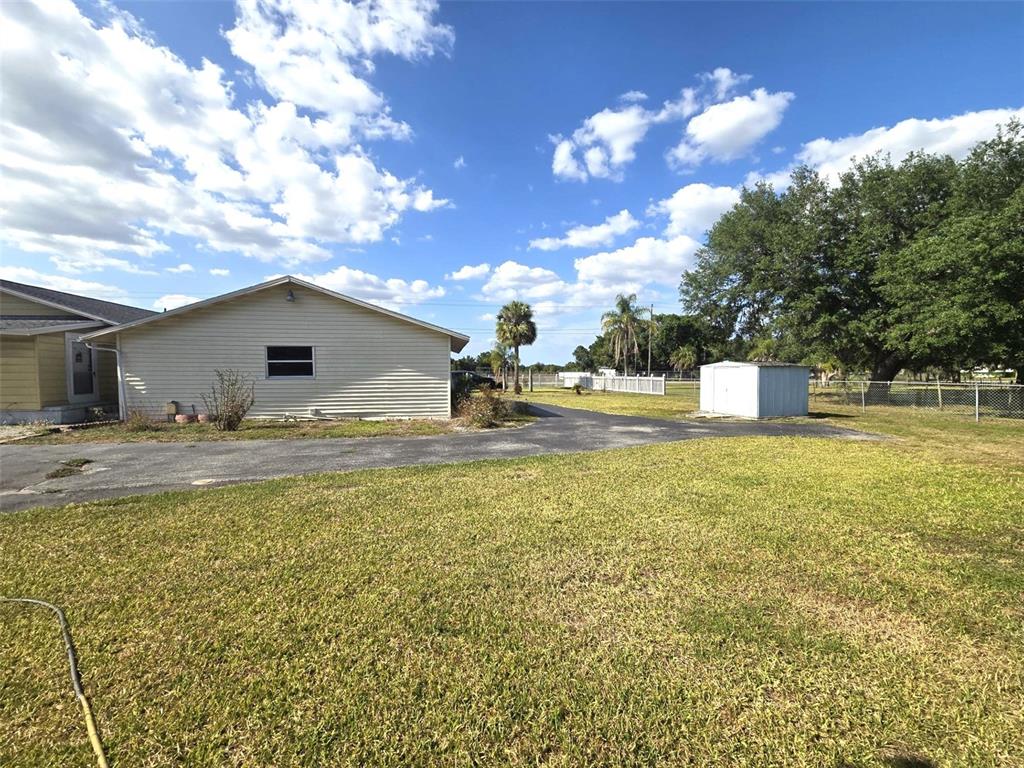 3101 Medulla Road Plant City, FL 33566 - Photo 56 of 83 a swimming pool with outdoor seating and yard
