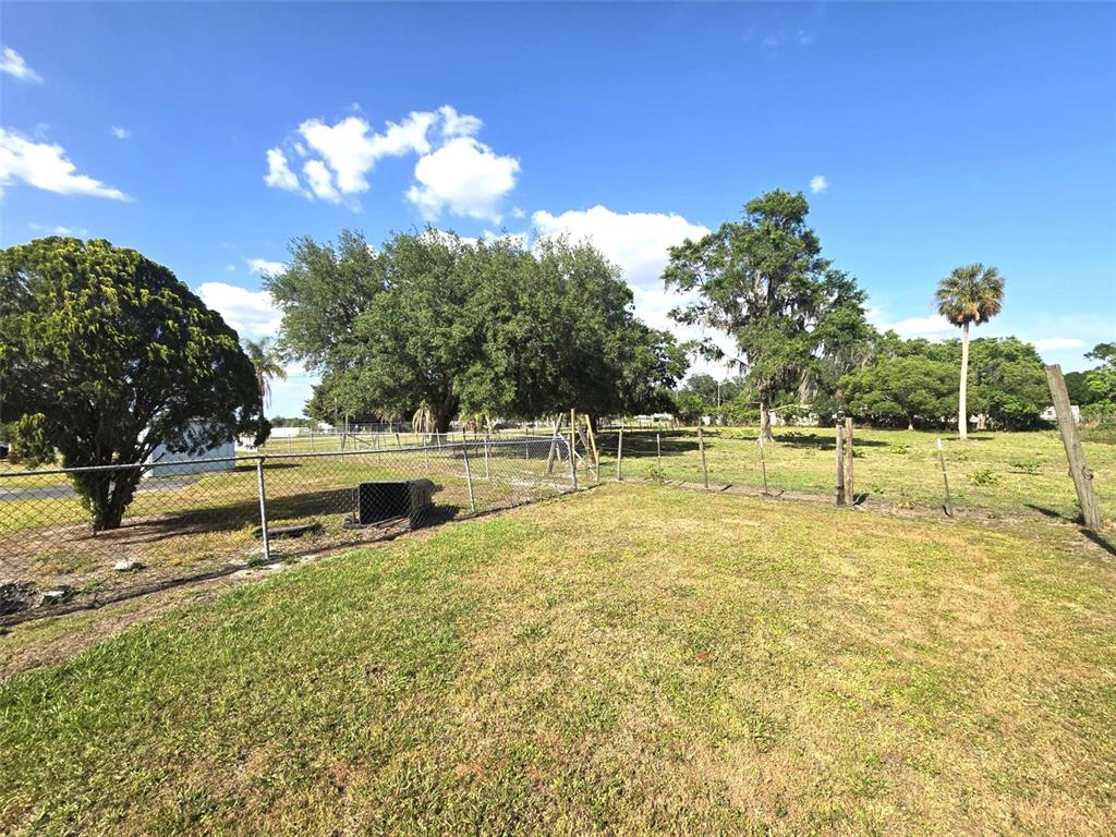 3101 Medulla Road Plant City, FL 33566 - Photo 63 of 83 a swimming pool with outdoor seating and yard