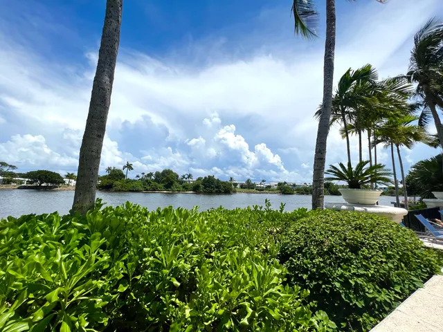 a view of house with swimming pool outdoor seating