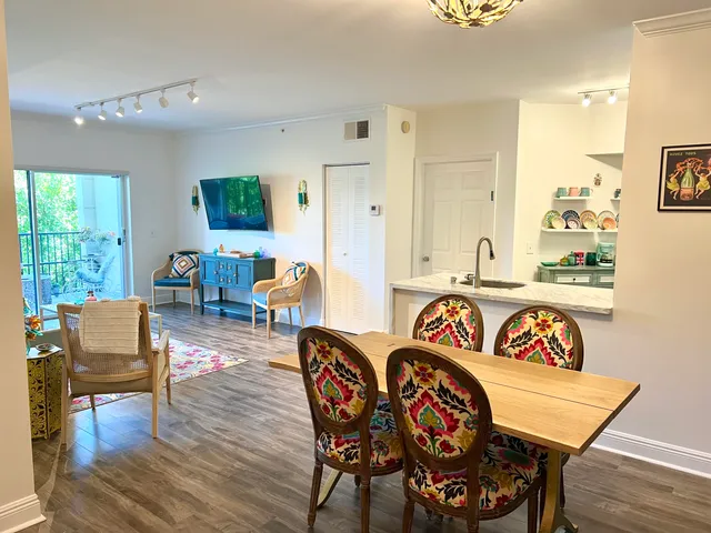 a theatre with furniture and wooden floor