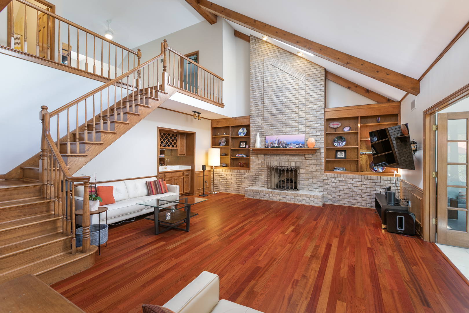 23W250 Hampton Circle Naperville, IL 60540 - Photo 17 of 42 a view of entryway livingroom and hall with wooden floor