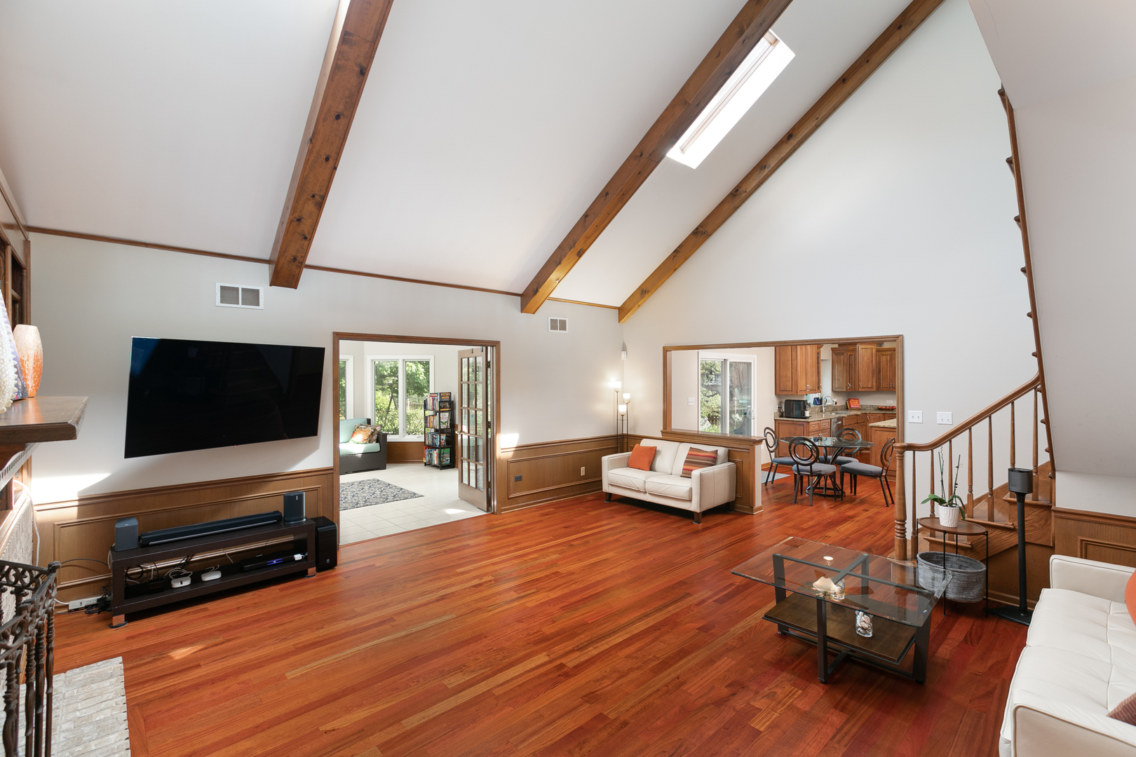 23W250 Hampton Circle Naperville, IL 60540 - Photo 22 of 42 a living room with furniture and a flat screen tv