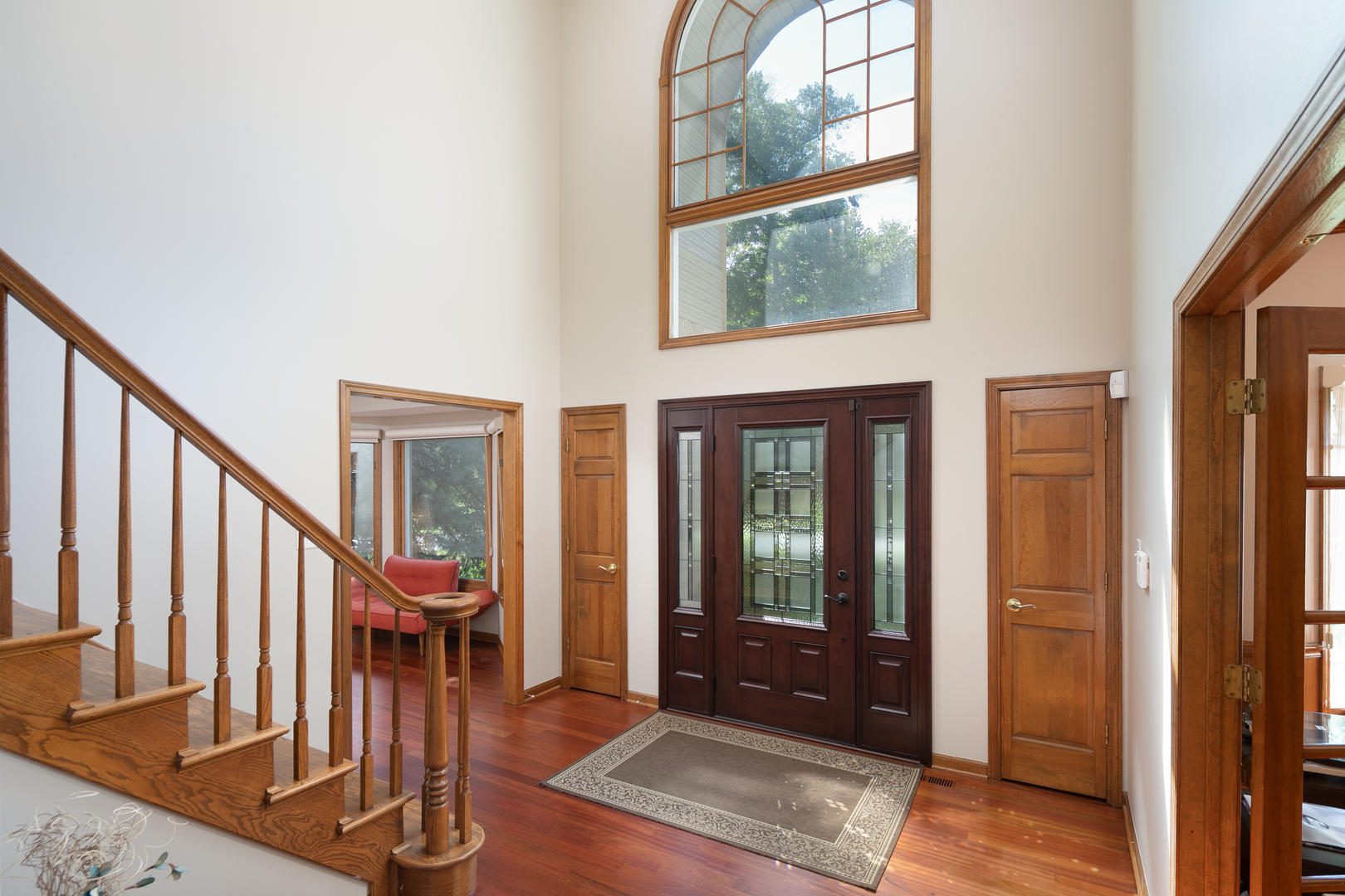 23W250 Hampton Circle Naperville, IL 60540 - Photo 6 of 42 a view of entryway and hall with wooden floor