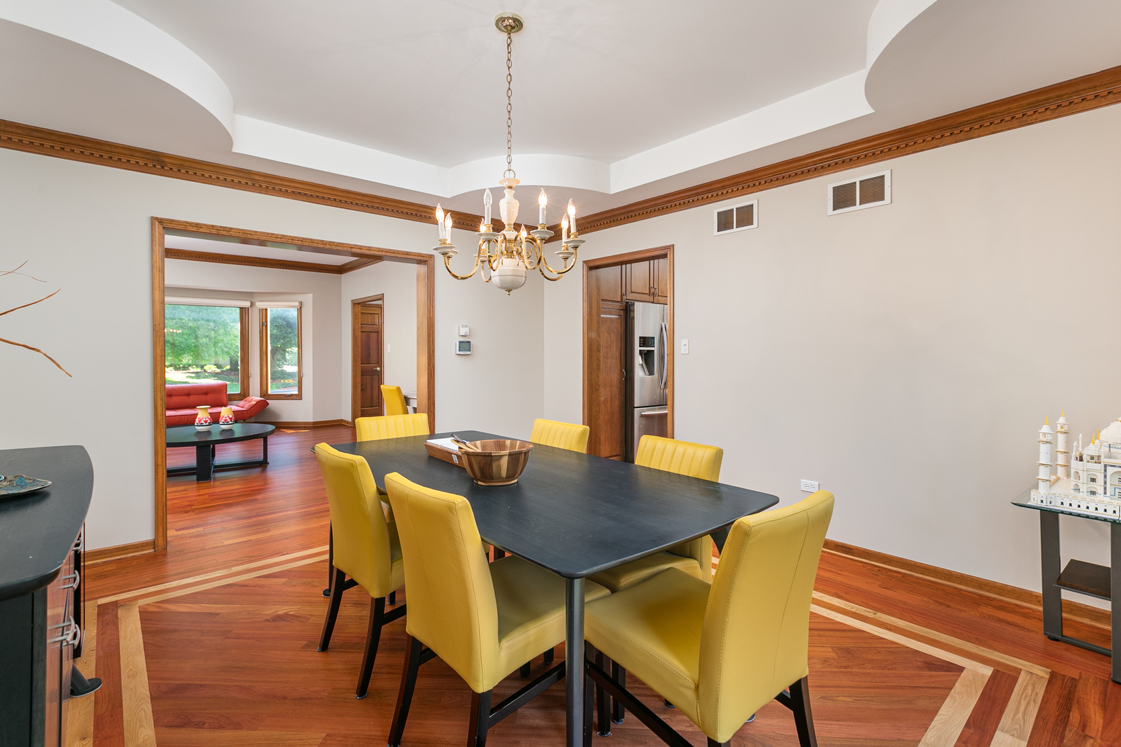 23W250 Hampton Circle Naperville, IL 60540 - Photo 10 of 42 a view of a dining room with furniture and wooden floor