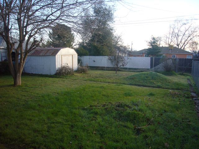 4559 Cedars Road Redding, CA 96001 - Photo 11 of 12 a view of a back yard