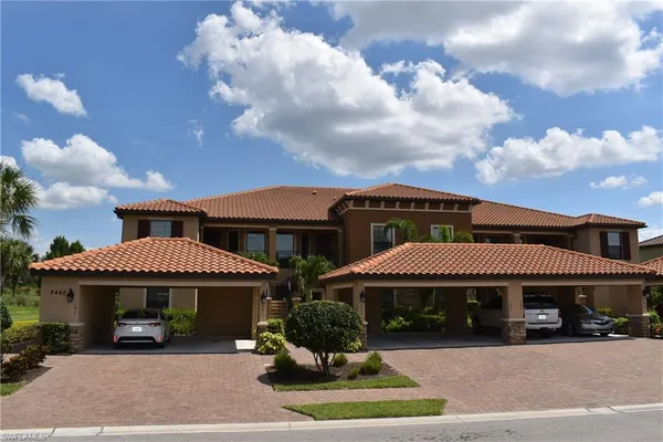 a front view of a house with yard