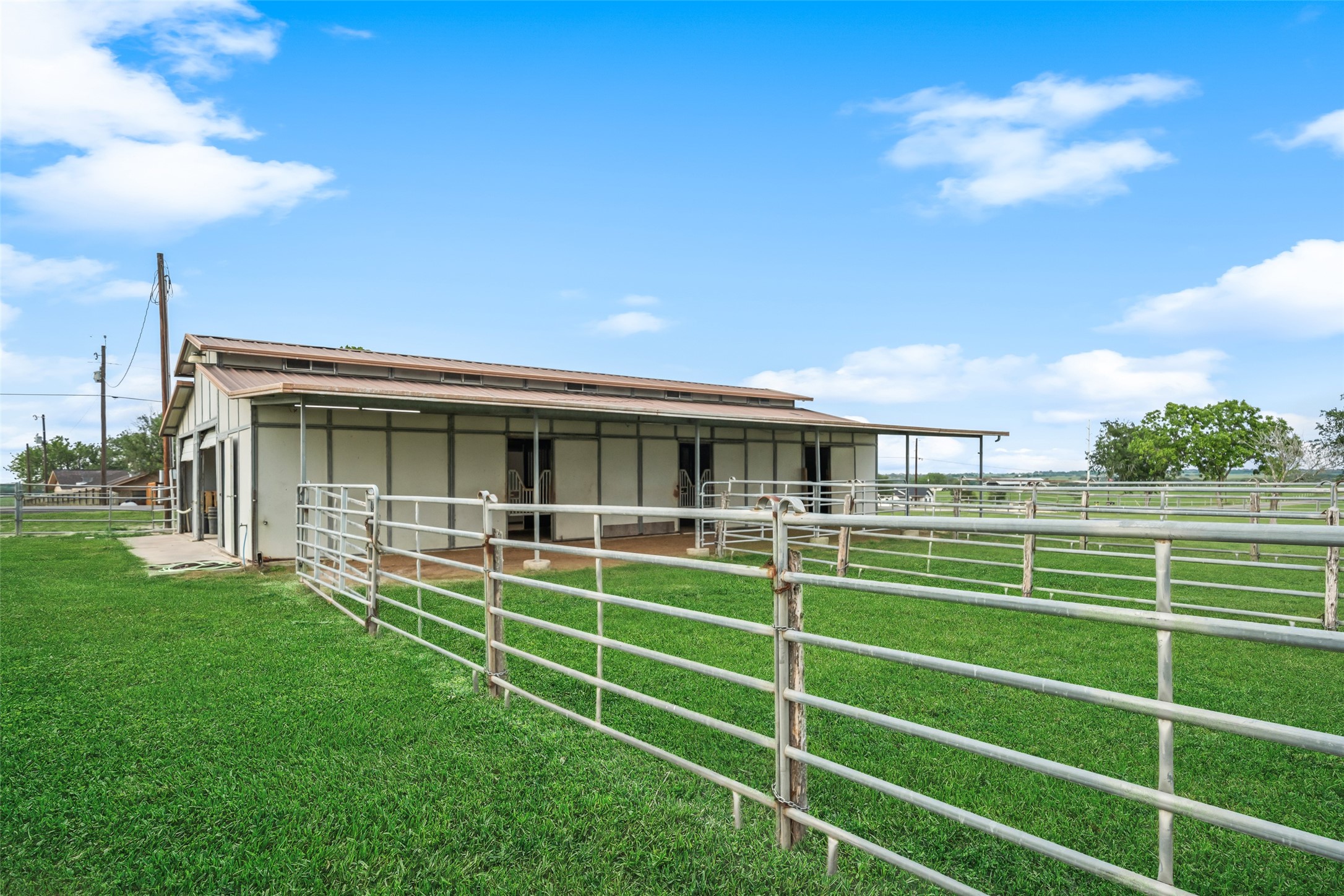 119 Fm 1891 Shiner, TX 77984 - Photo 32 of 40 a view of a wooden deck with a big yard