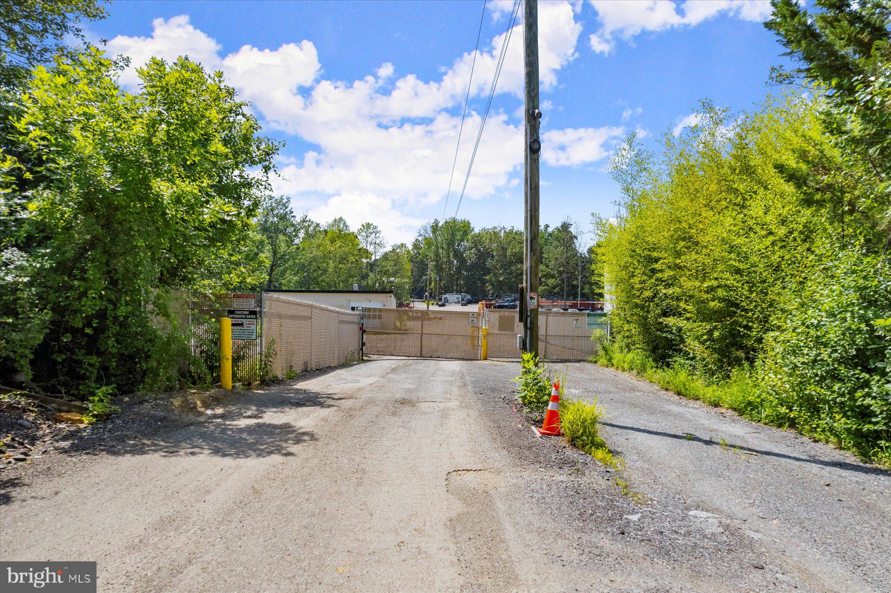 12072 Hall Shop Road Clarksville, MD 21029 - Photo 1 of 19 Main Gated Entrance from Hall Shop Road