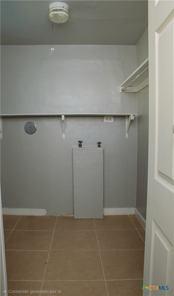 1407 South 7th Street Temple, TX 76504 - Photo 25 of 36 a bathroom with a shower