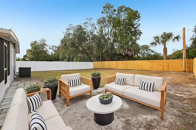 an aerial view of residential building and ocean