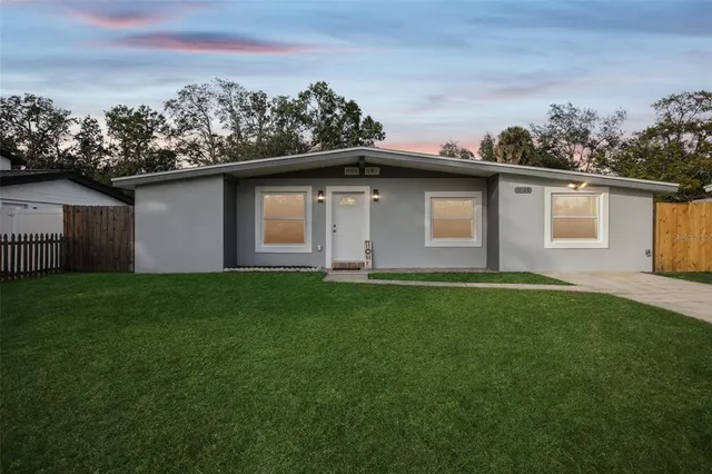 front view of a house with a yard