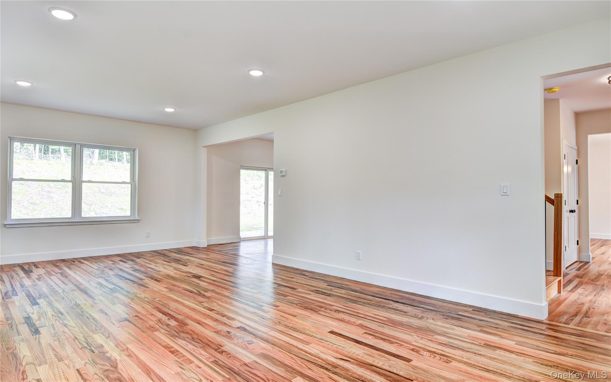 20 Wells Road Newburgh, NY 12550 - Photo 15 of 47 wooden floor in an empty room with a window