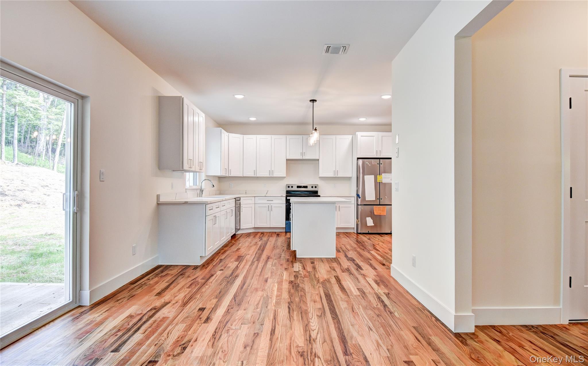 20 Wells Road Newburgh, NY 12550 - Photo 16 of 47 a view of kitchen with wooden floor
