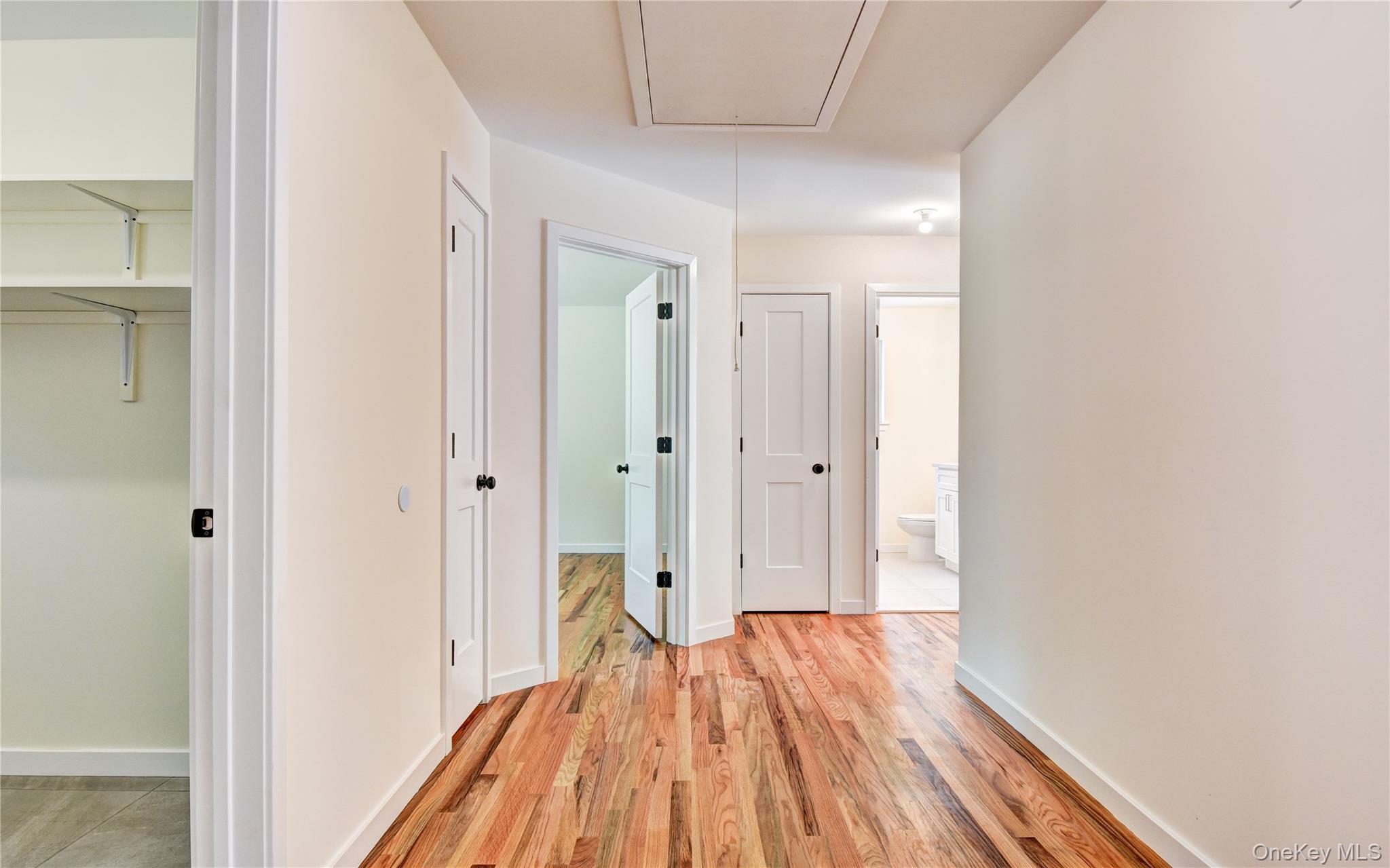 20 Wells Road Newburgh, NY 12550 - Photo 18 of 47 a view of a room with wooden floor and a bathroom