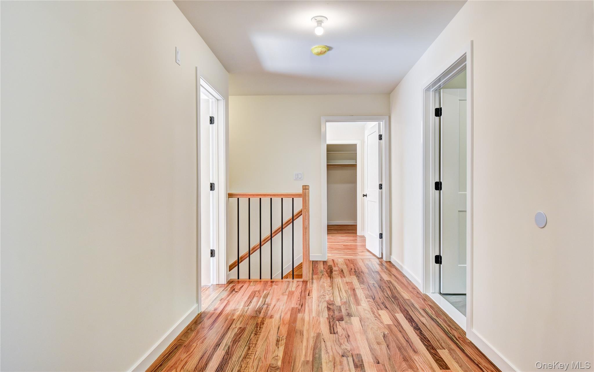 20 Wells Road Newburgh, NY 12550 - Photo 20 of 47 a view of a hallway with wooden floor and staircase