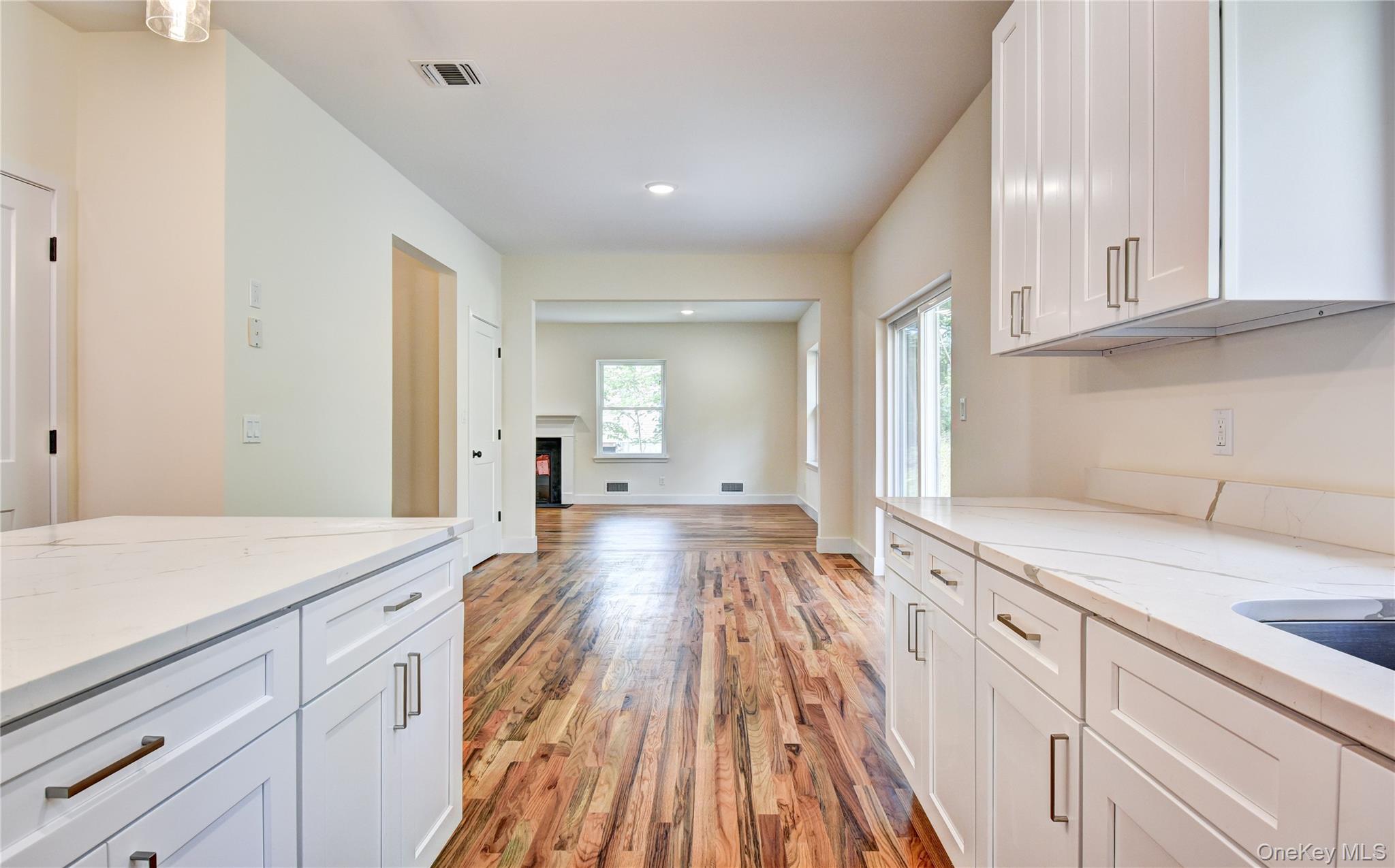 20 Wells Road Newburgh, NY 12550 - Photo 47 of 47 a view of a kitchen counter space and wooden floor