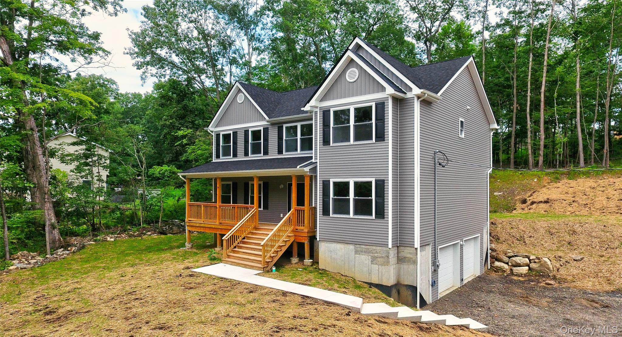 20 Wells Road Newburgh, NY 12550 - Photo 46 of 47 a view of a house with a yard and large trees