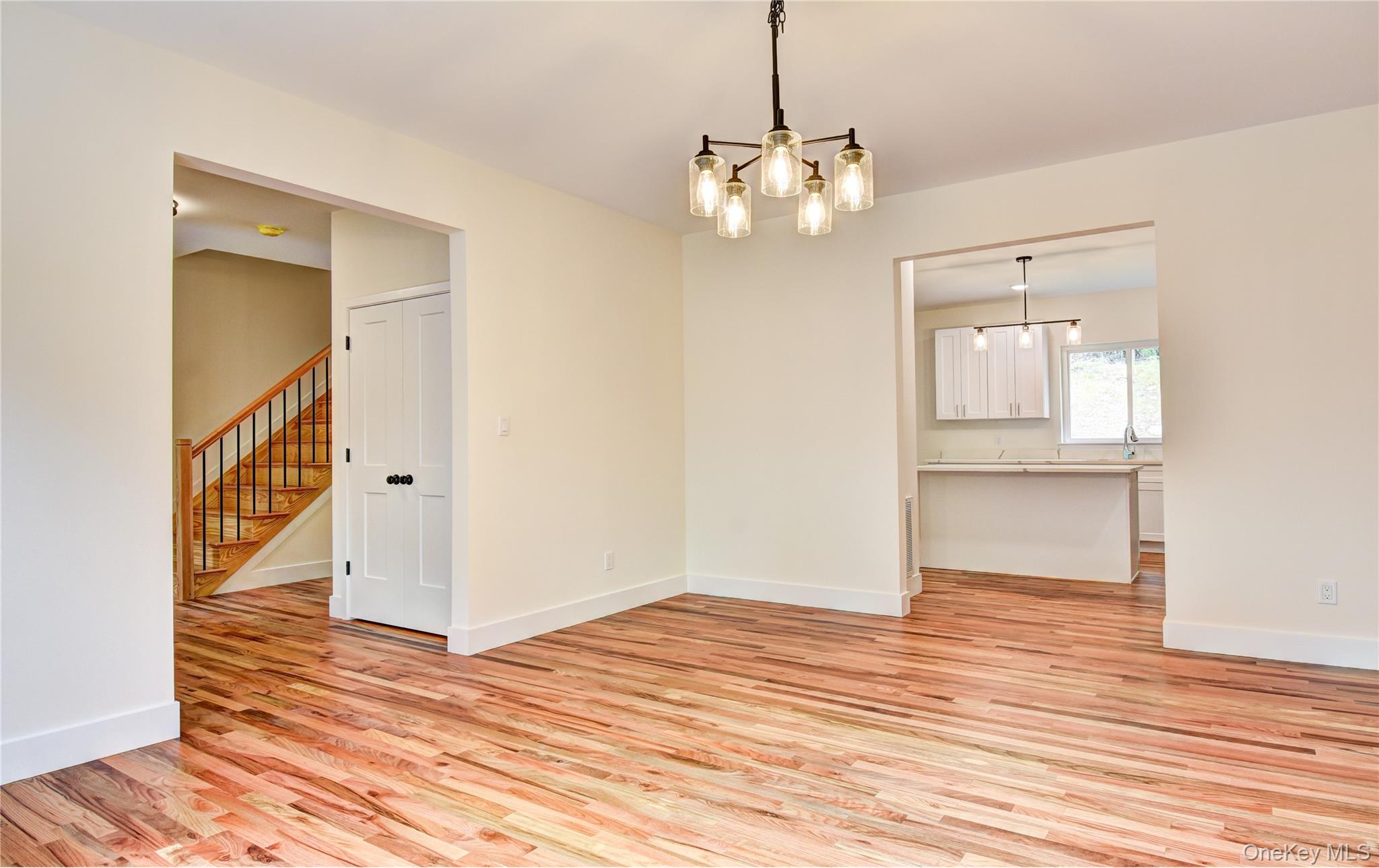 20 Wells Road Newburgh, NY 12550 - Photo 9 of 47 a view of an empty room with wooden floor and a window