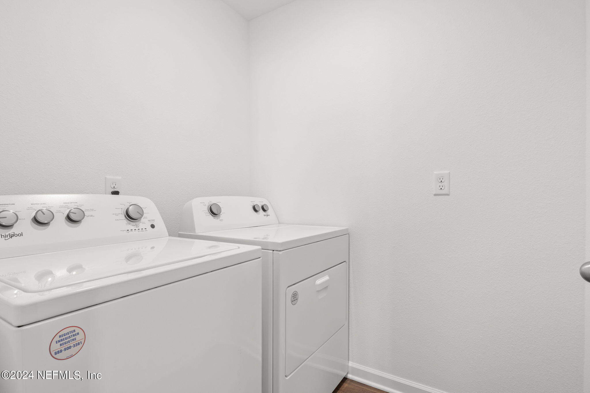 12573 Rubber Fig Terrace Jacksonville, FL 32218 - Photo 18 of 24 a utility room with dryer and washer