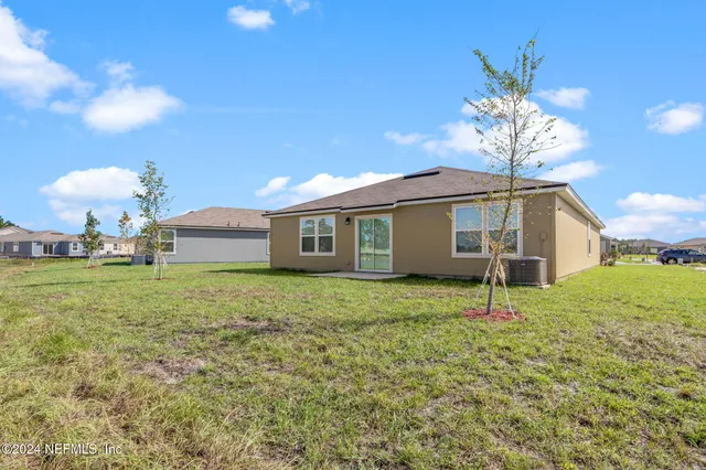 a house view with a garden space