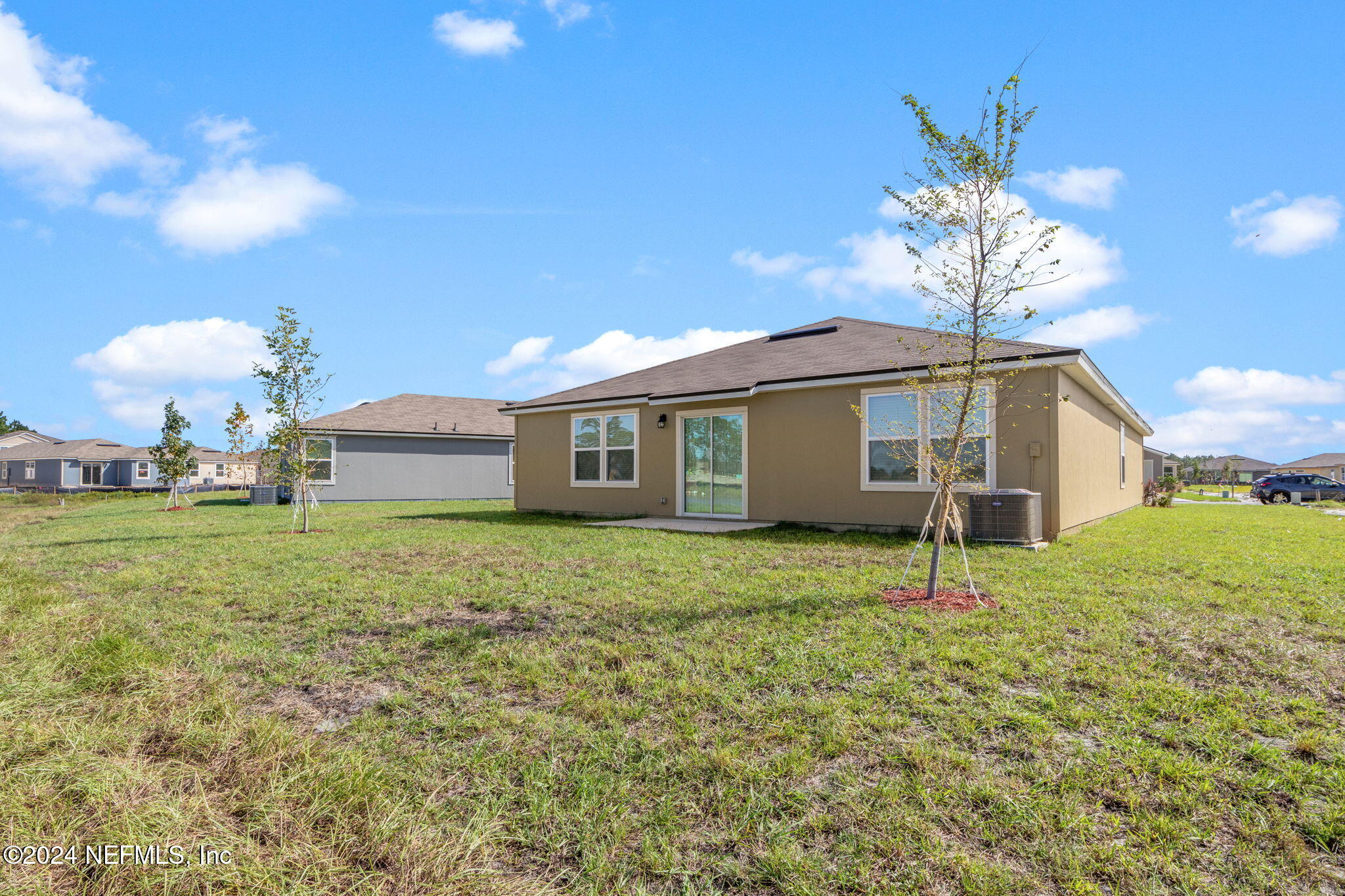 12573 Rubber Fig Terrace Jacksonville, FL 32218 - Photo 20 of 24 a house view with a garden space