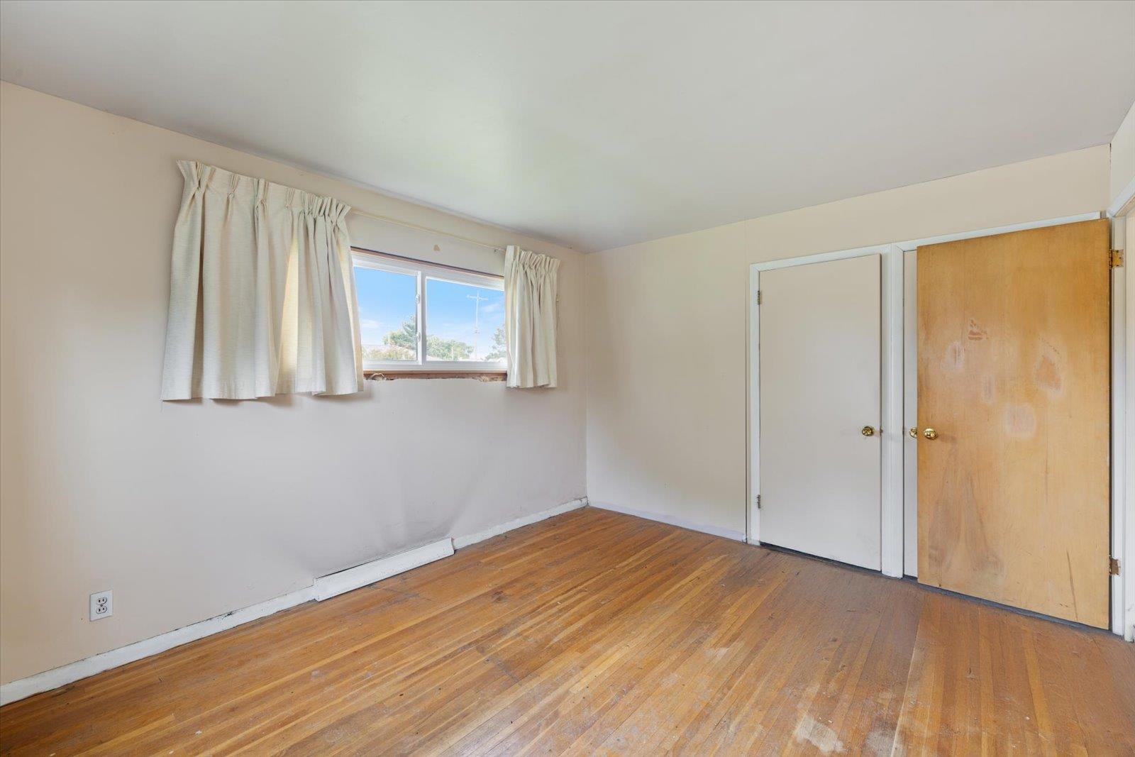 202 Suffolk Drive Hoyt Lakes, MN 55750 - Photo 16 of 33 Empty room with wood-type flooring