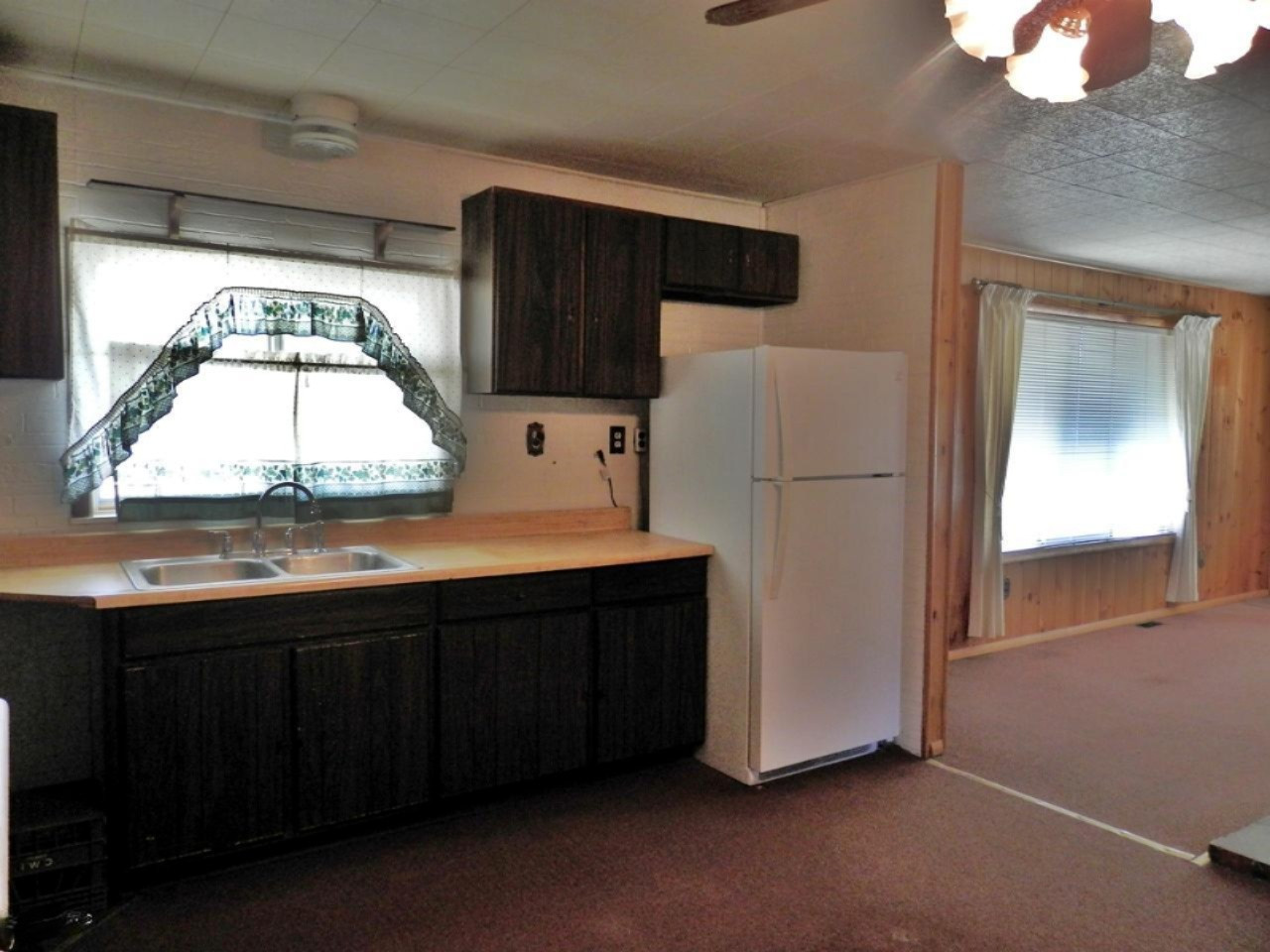 10230 Marilla Road Copemish, MI 49625 - Photo 4 of 26 Kitchen opens to living room
