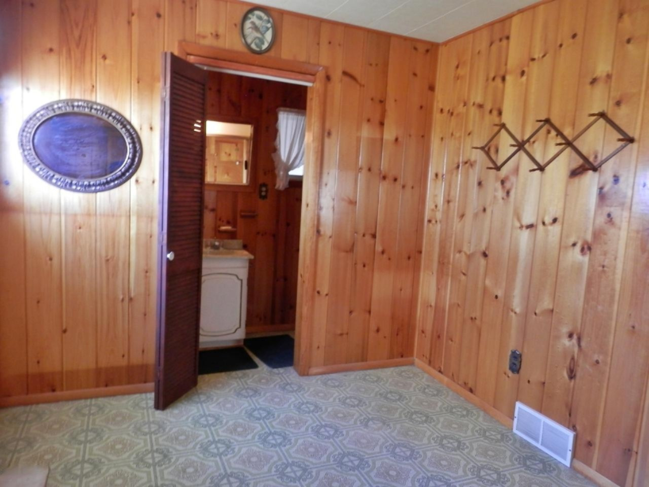 10230 Marilla Road Copemish, MI 49625 - Photo 8 of 26 Master bedroom opens to bath