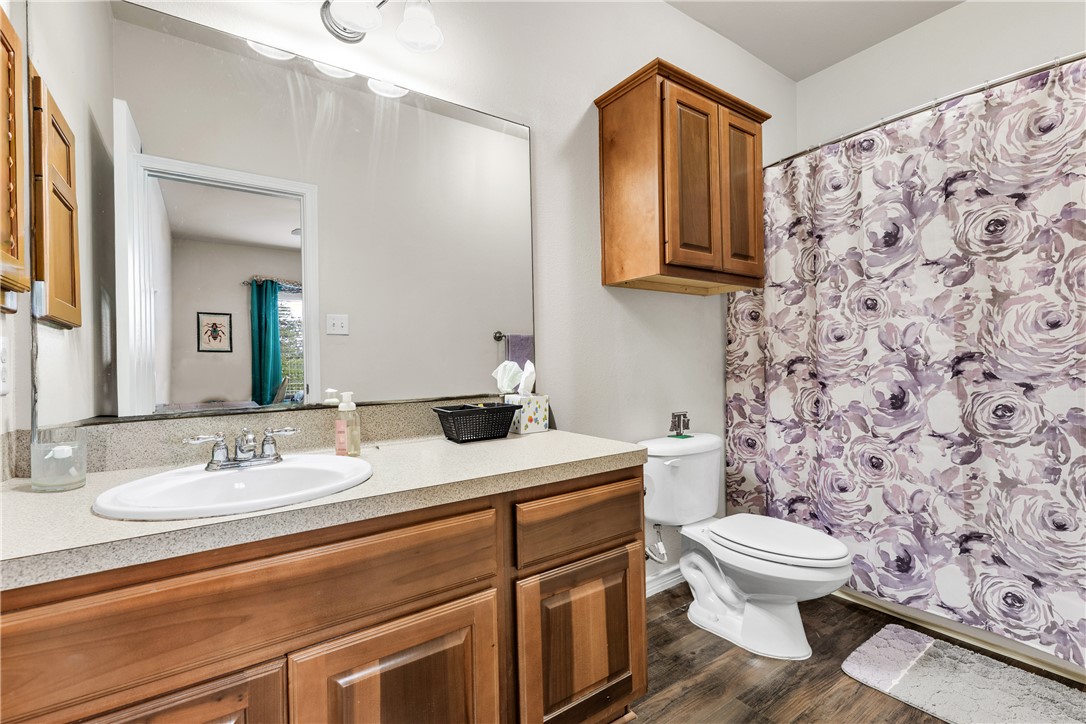 1425 West Villa Maria Road, Unit 1004 Bryan, TX 77801 - Photo 18 of 23 a bathroom with a sink toilet and shower