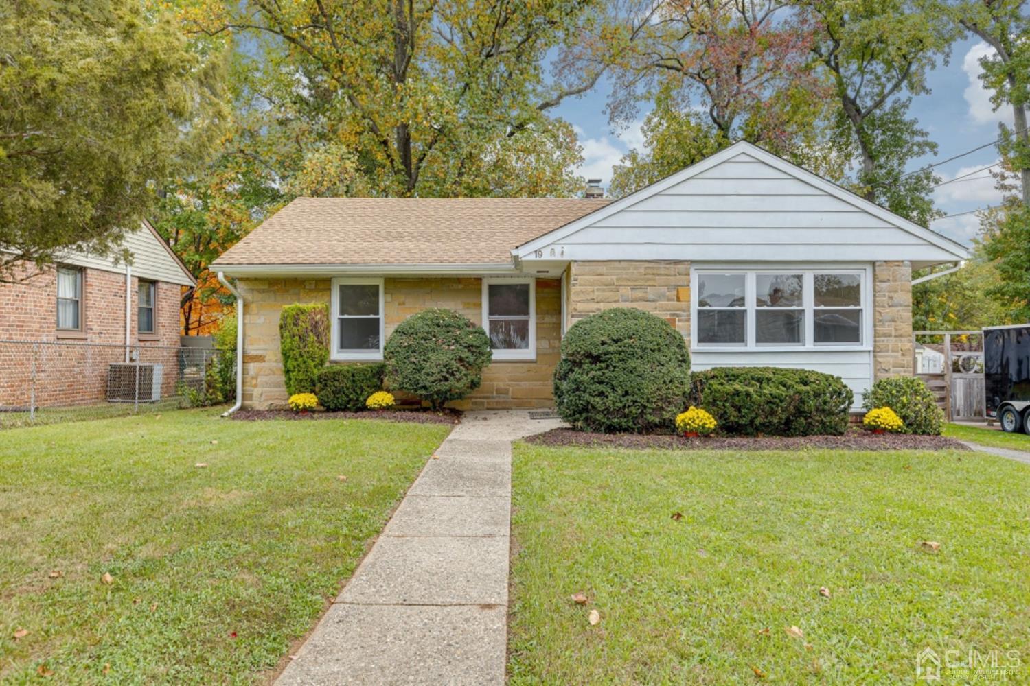19 Melville Road Edison, NJ 08817 - Photo 22 of 26 front view of a house and a yard