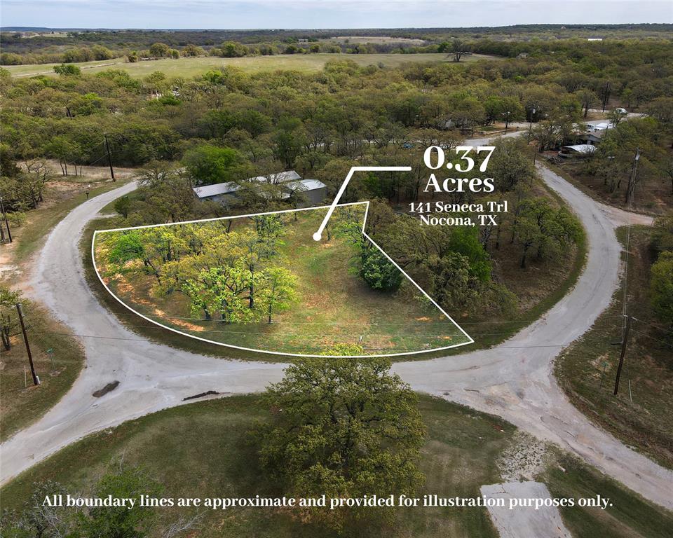 141 Seneca Trail Nocona, TX 76255 - Photo 1 of 8 a view of a swimming pool with a yard