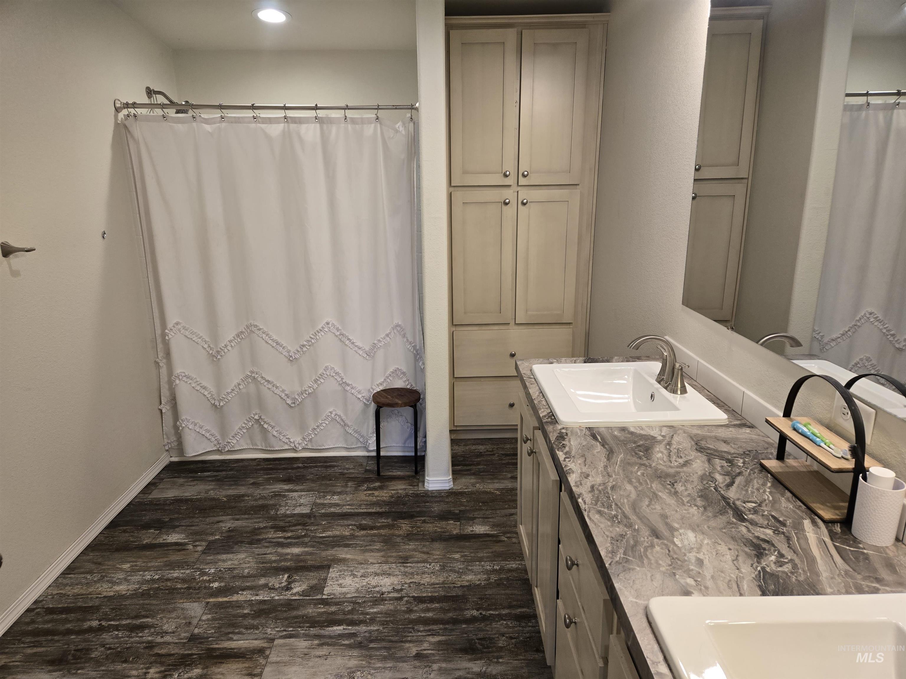 174 Konkolville Road Orofino, ID 83544 - Photo 19 of 43 Dual vanity with integrated sinks and brushed nickel faucets