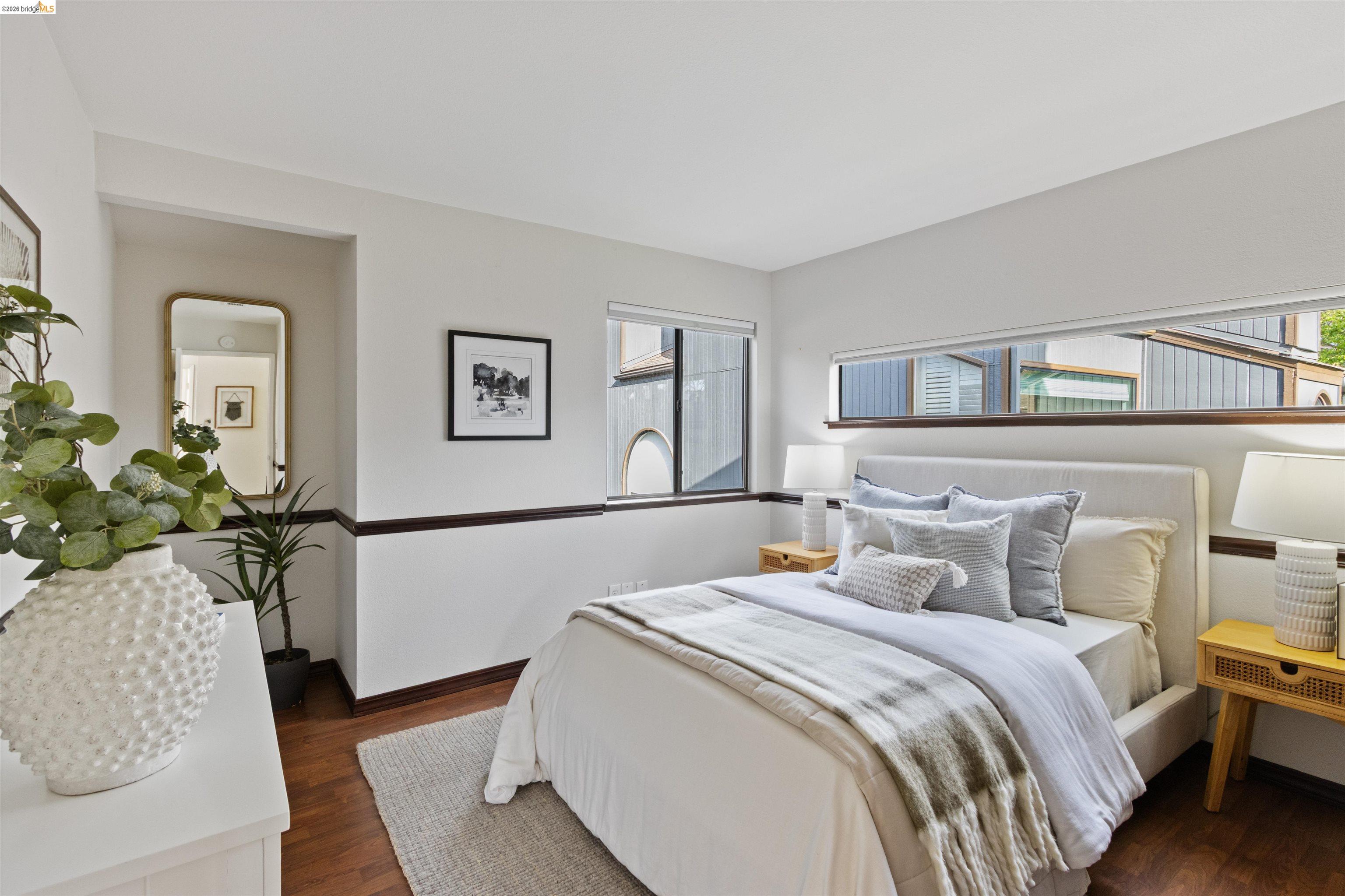 548 Queen's Road Alameda, CA 94501 - Photo 24 of 42 Bedroom featuring dark wood finished floors and baseboards
