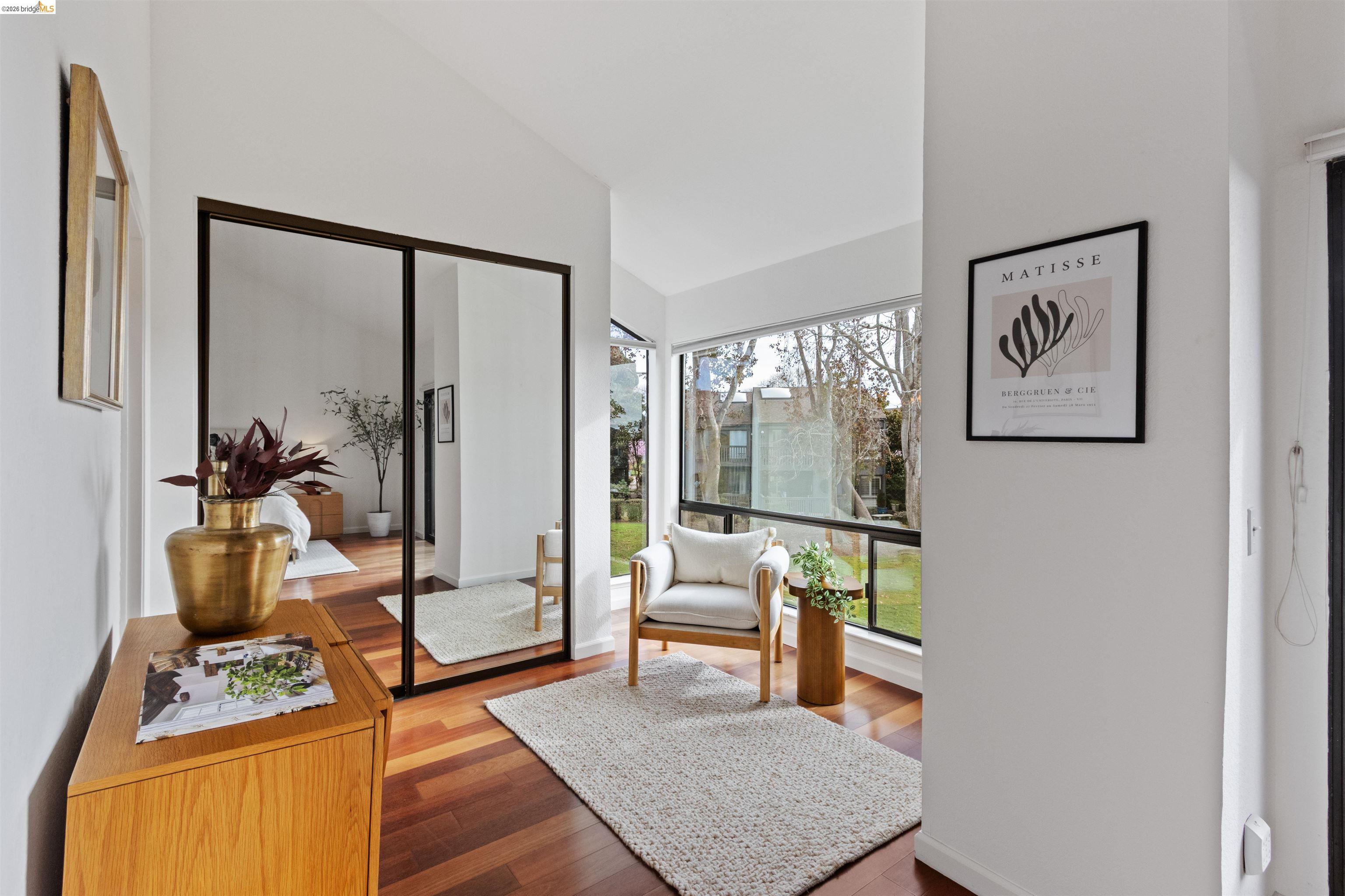 548 Queen's Road Alameda, CA 94501 - Photo 29 of 42 Sitting room with vaulted ceiling and wood finished floors