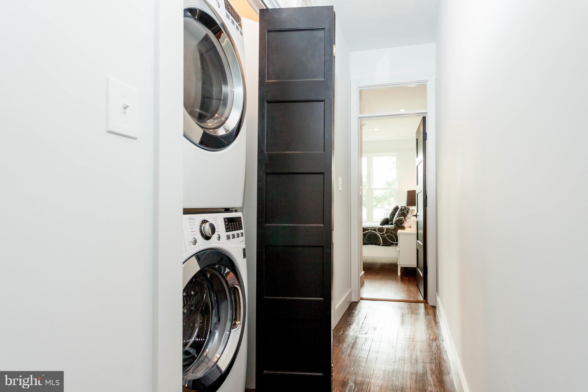 15 R Street Northeast, Unit A Washington, DC 20002 - Photo 14 of 25 a utility room with dryer and washer