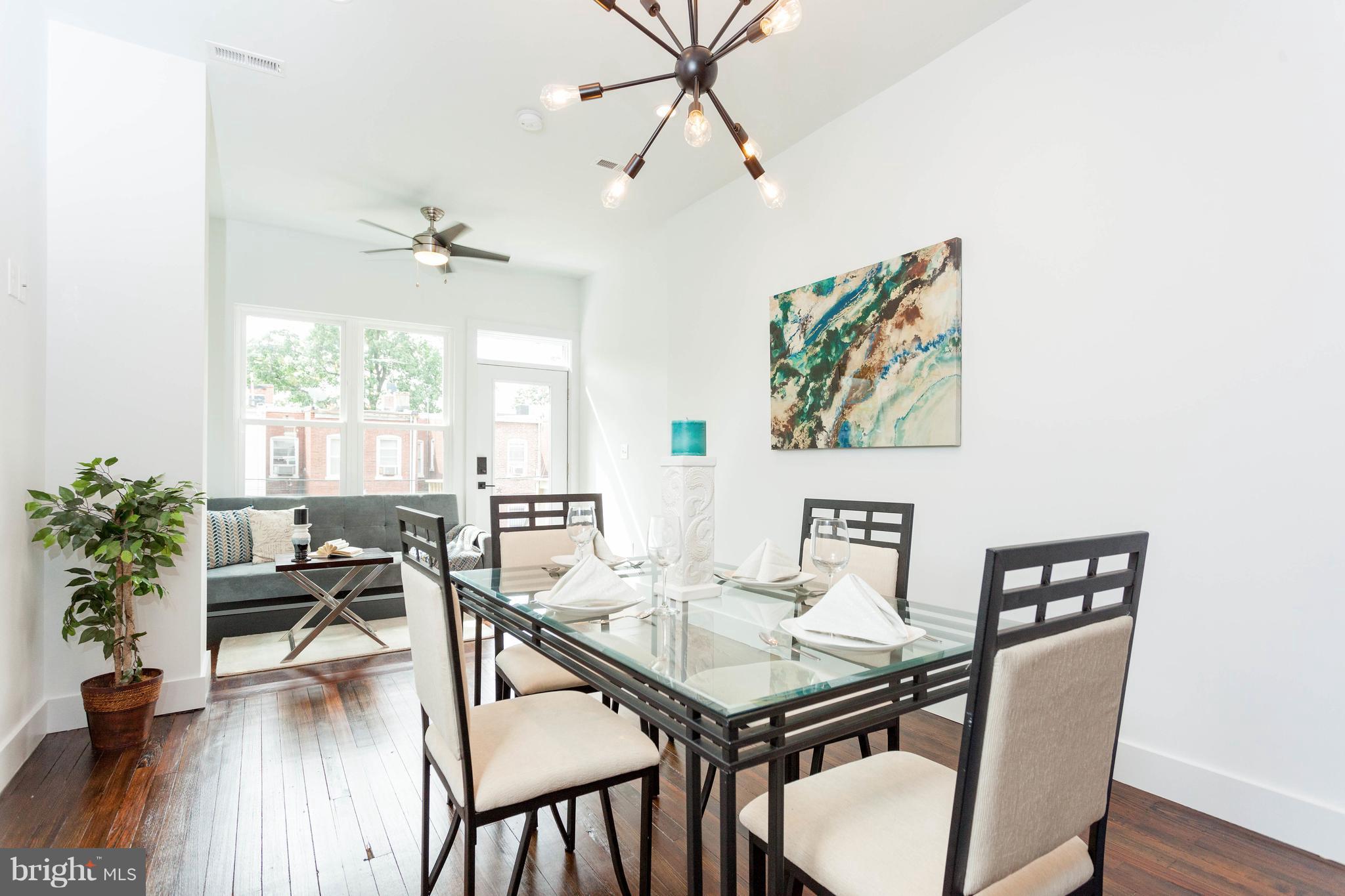 15 R Street Northeast, Unit A Washington, DC 20002 - Photo 9 of 25 a view of a dining room with furniture window and wooden floor