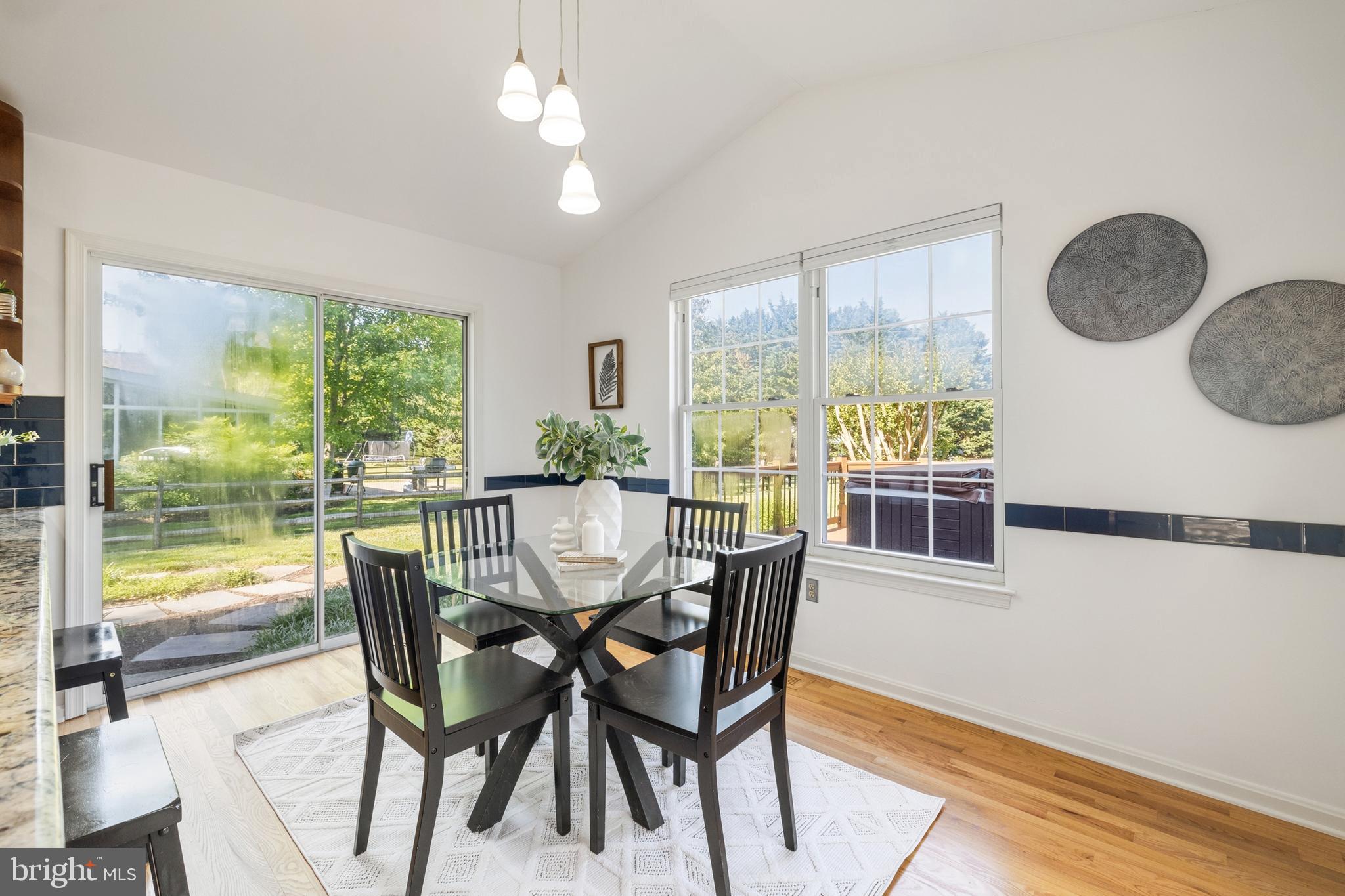 1469 Pleasant Lake Road Annapolis, MD 21409 - Photo 13 of 68 Kitchen table and sun room