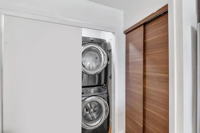 a view of washer and dryer in a utility room