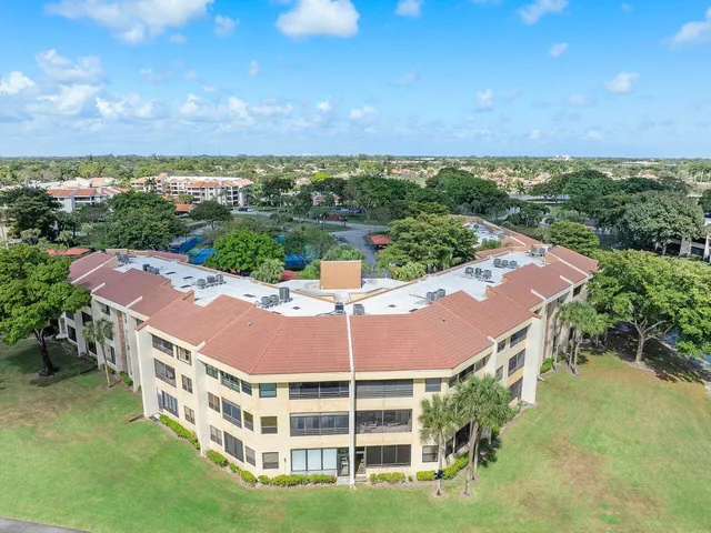 an outdoor space with pool and ocean view