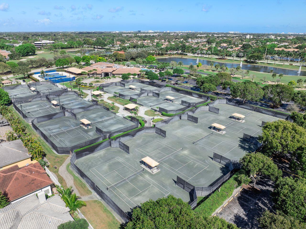 7508 La Paz Boulevard, Unit 304 Boca Raton, FL 33433 - Photo 32 of 44 an aerial view of multiple house