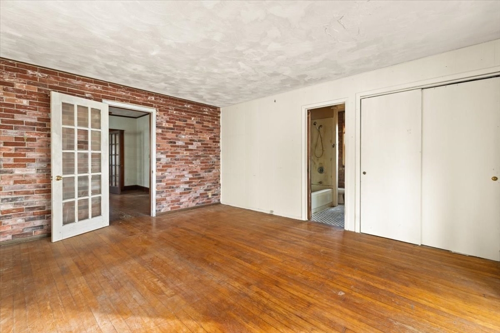 1496 Riverside Avenue Somerset, MA 02726 - Photo 14 of 40 a view of an empty room with a closet