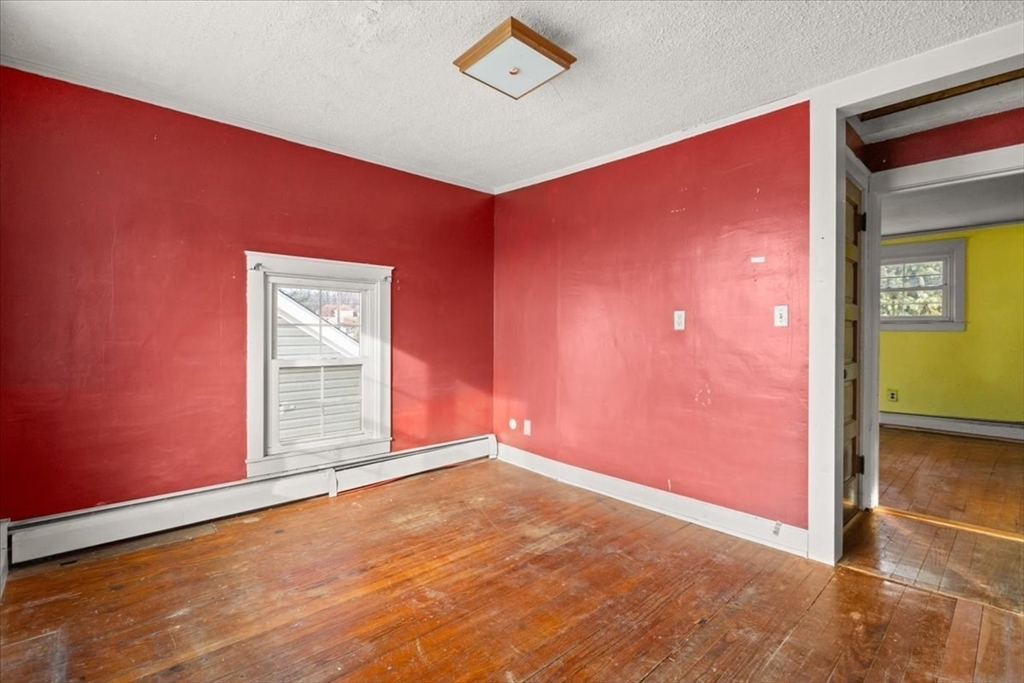 1496 Riverside Avenue Somerset, MA 02726 - Photo 33 of 40 an empty room with windows
