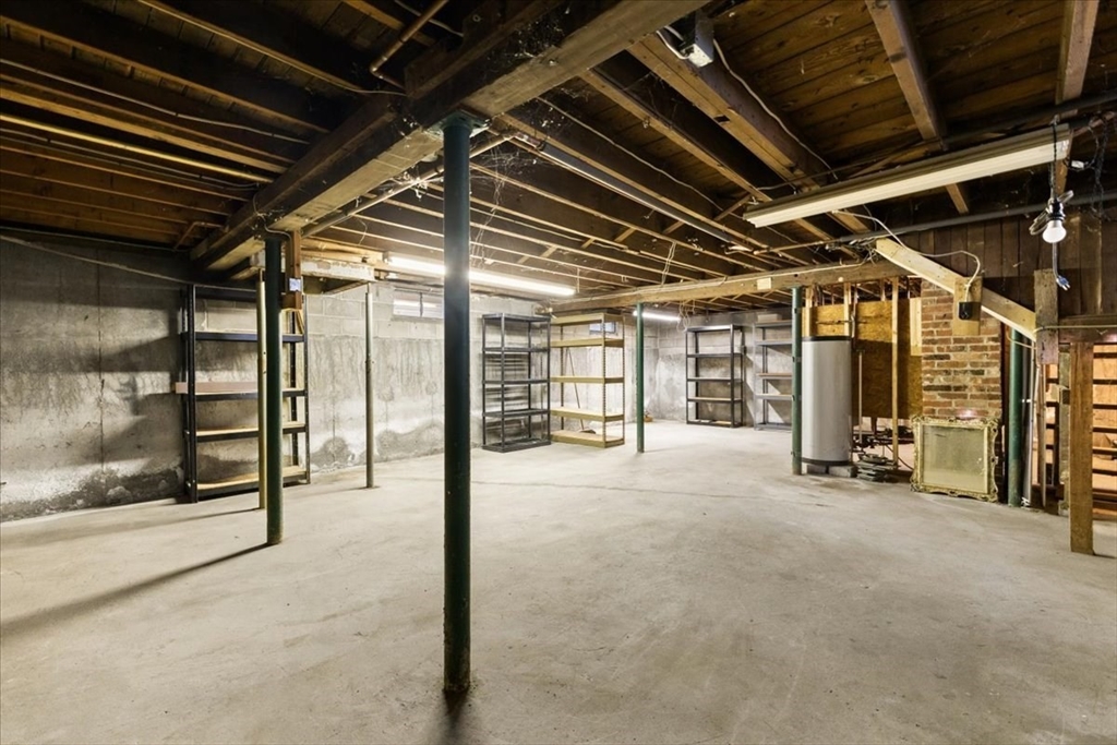 1496 Riverside Avenue Somerset, MA 02726 - Photo 37 of 40 a view of an empty room with wooden roof