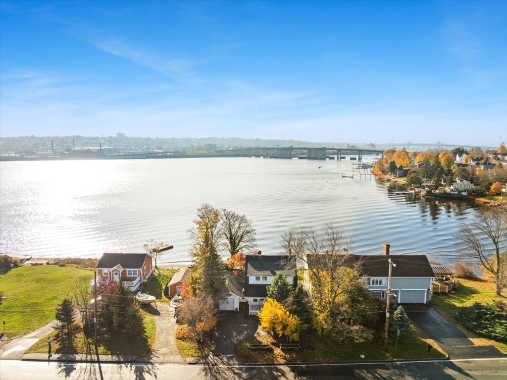 1496 Riverside Avenue Somerset, MA 02726 - Photo 4 of 40 a view of a city and ocean view