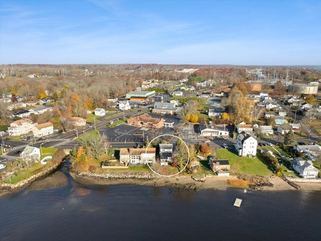 1496 Riverside Avenue Somerset, MA 02726 - Photo 9 of 40 an aerial view of residential houses with city view