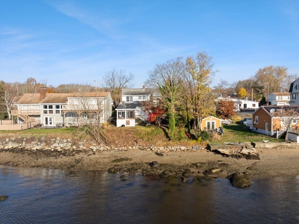 1496 Riverside Avenue Somerset, MA 02726 - Photo 10 of 40 a view of a town with big trees