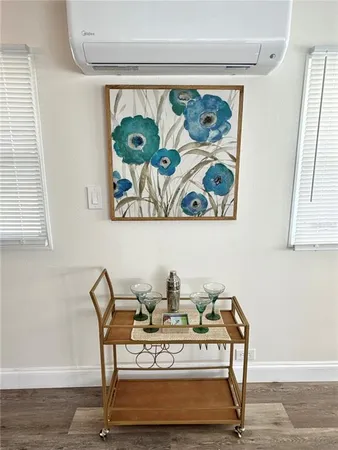 a view of a dining area with furniture and rug
